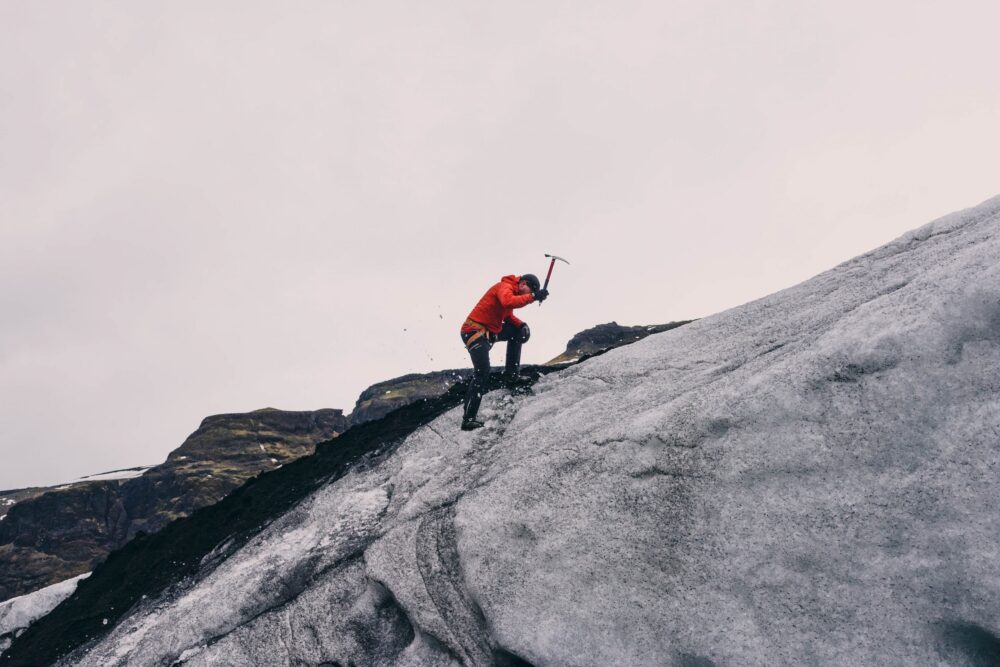 Man climbing mountain